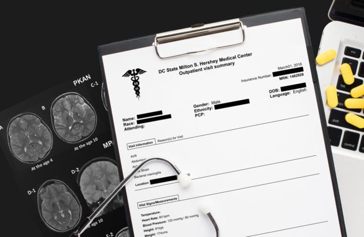 Redacted medical record, highlighted PHI that has been redacted to protect data privacy in healthcare industry