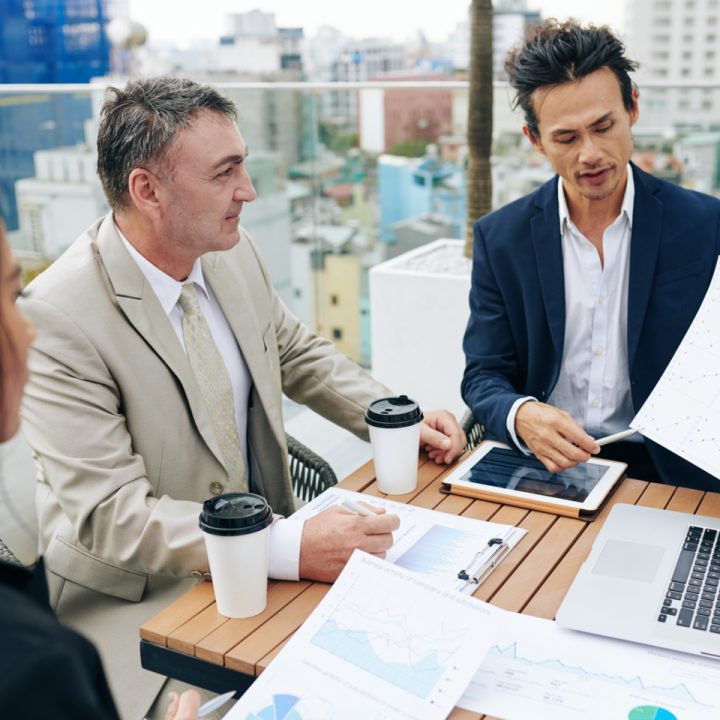 CaseGuard-financial-analyst-showing-report-to-colleagues