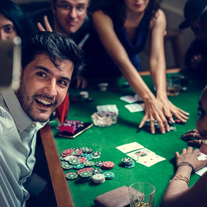CaseGuard-group-of-people-playing-gamble-in-casino-and-takin