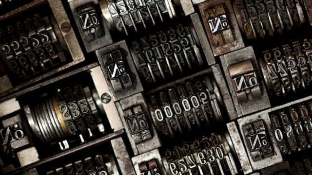 Rows of metal cogs with numbers on them