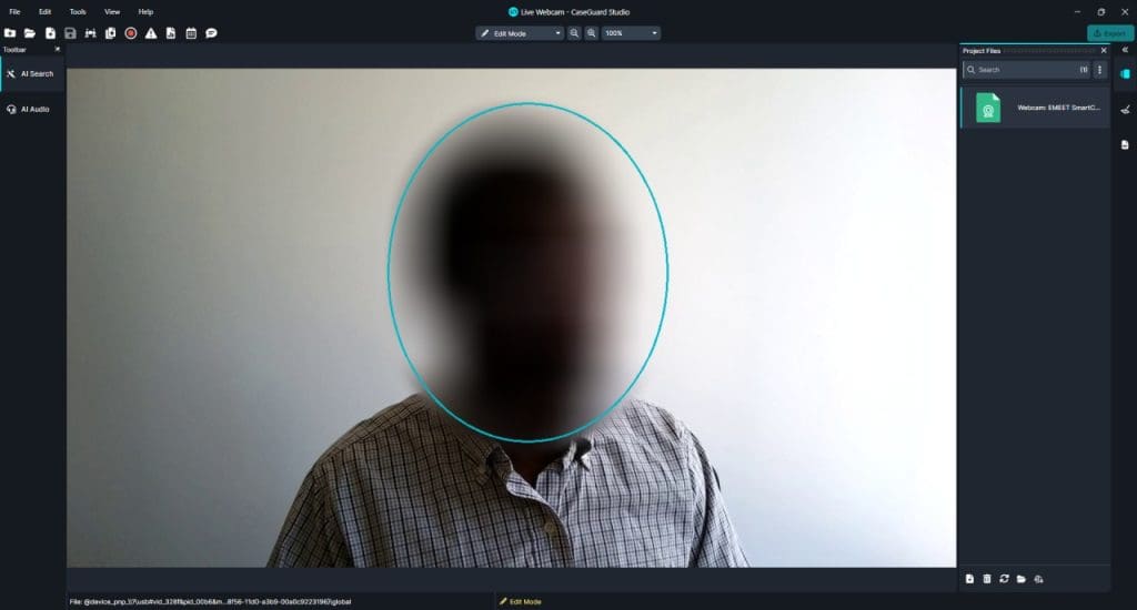 Screenshot of a webcam in CaseGuard Studio showing a blurred person outlined by a blue oval highlight in a dark UI.